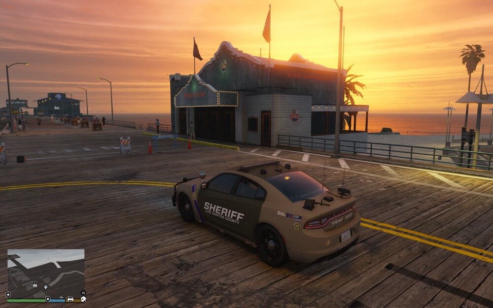Could contain: sky, vehicle, land vehicle, outdoor, wheel, ground, screenshot, cloud, car, track, parked, sunset