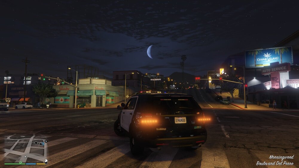 Could contain: vehicle, land vehicle, outdoor, moon, sky, text, car, night, wheel, road, street, light, ground