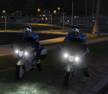 Could contain: outdoor, wheel, vehicle, transport, tire, screenshot, night, road, ground, motorcycle, person, light