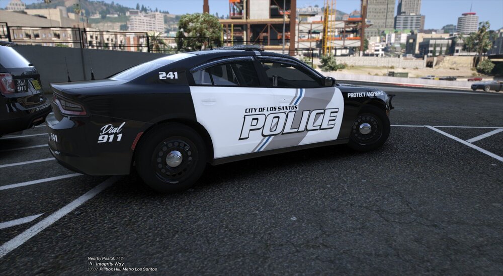 Could contain: vehicle, land vehicle, wheel, text, outdoor, transport, road, car, tire, mid-size car, full-size car, sports sedan, auto part, automotive design, sedan, alloy wheel, street, police