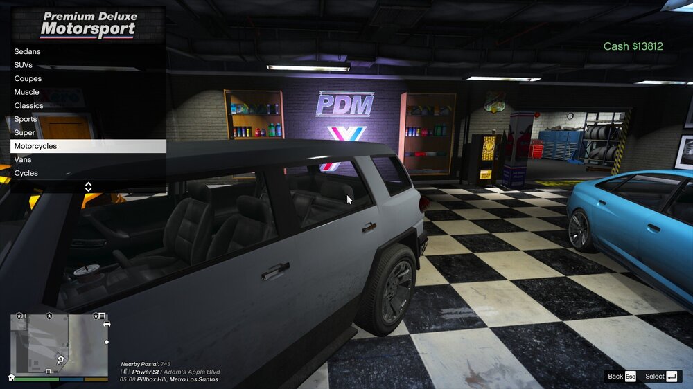 Could contain: vehicle, land vehicle, text, wheel, screenshot, car, indoor, ceiling, parked