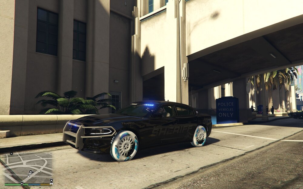 Could contain: wheel, tire, vehicle, building, land vehicle, outdoor, car, auto part, road, ground, transport, automotive design, parked, street