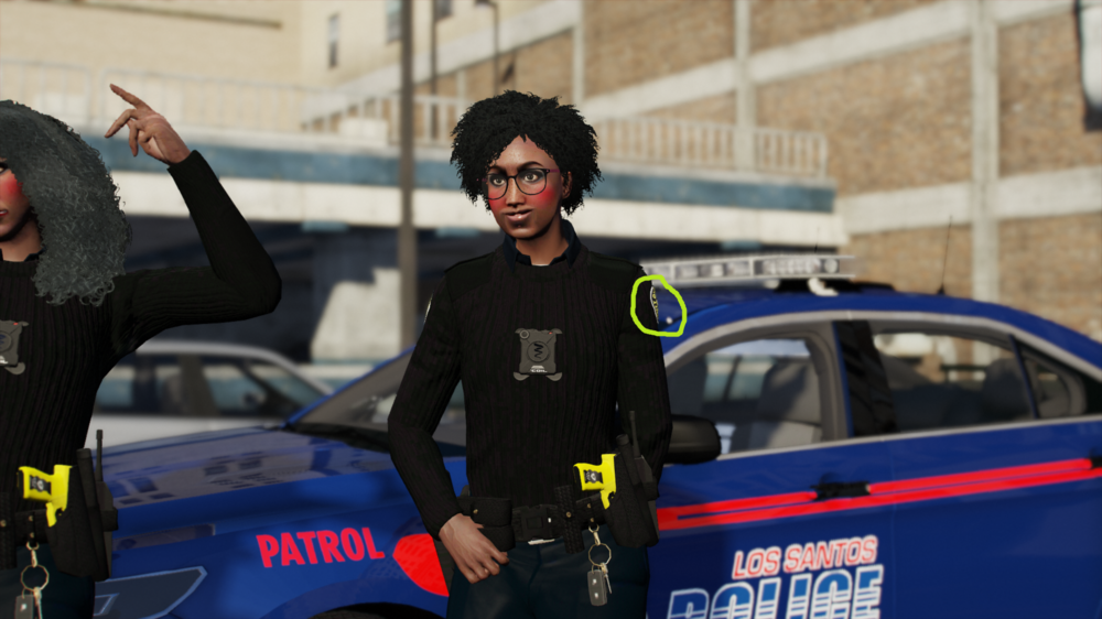 Could contain: person, vehicle, land vehicle, clothing, outdoor, wheel, building, human face, car, wet suit