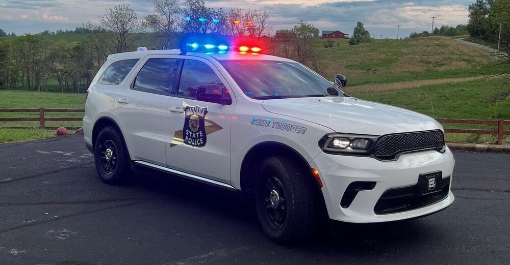 Could contain: land vehicle, vehicle, wheel, outdoor, transport, tire, bumper, police car, auto part, text, sport utility vehicle, police, car, ford, grille, law enforcement, automotive light bulb, full-size car, ford motor company, emergency vehicle, mitsubishi, compact sport utility vehicle, suv