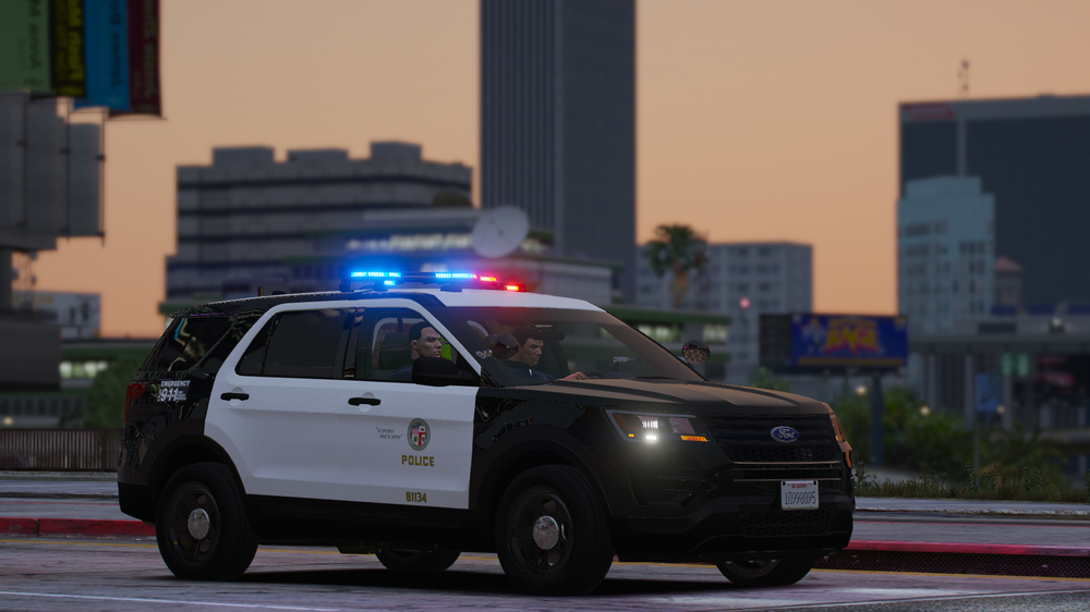 Could contain: vehicle, land vehicle, wheel, transport, outdoor, road, tire, police car, building, law enforcement, emergency vehicle, emergency service, motor vehicle, automotive exterior, police van, car, street, police, city, emergency