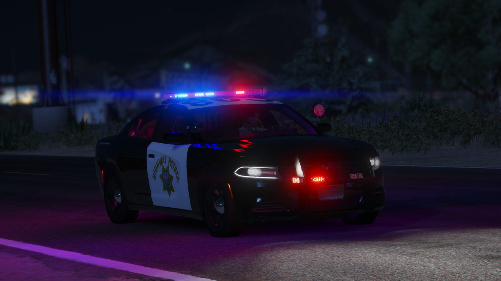 Could contain: vehicle, land vehicle, outdoor, wheel, road, tire, sports car, automotive design, automotive lighting, transport, performance car, auto part, motorsport, automotive tail & brake light, night, light, street, car