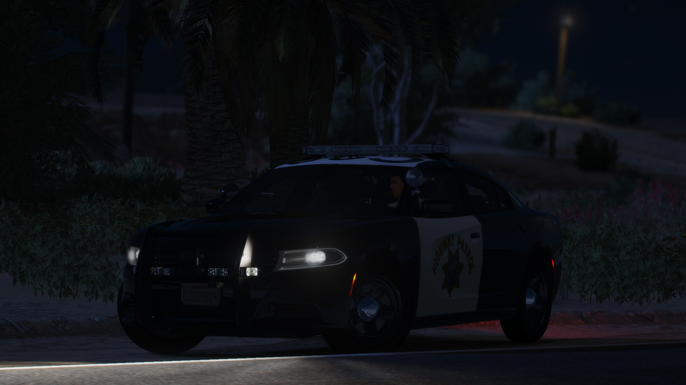 Could contain: vehicle, land vehicle, wheel, outdoor, automotive design, road, sports car, transport, tire, auto part, luxury vehicle, performance car, automotive lighting, supercar, car, street, night, dark