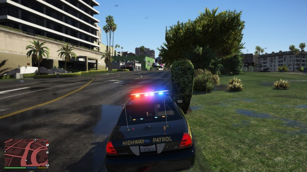 Could contain: outdoor, vehicle, land vehicle, tree, sky, grass, road, text, car