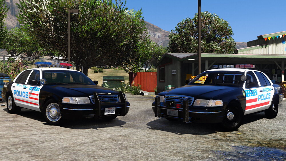 Could contain: vehicle, land vehicle, outdoor, wheel, sky, transport, law enforcement, full-size car, police car, tire, ford crown victoria police interceptor, vehicle registration plate, sedan, automotive exterior, text, automotive parking light, bumper, emergency service, police, car, ground, parked