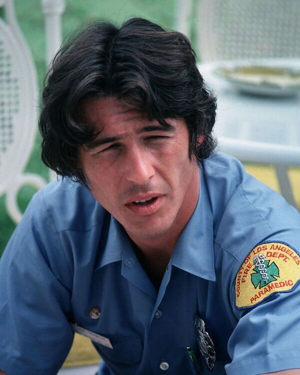 Could contain: person, human face, clothing, man, outdoor, blue, shirt, fabric