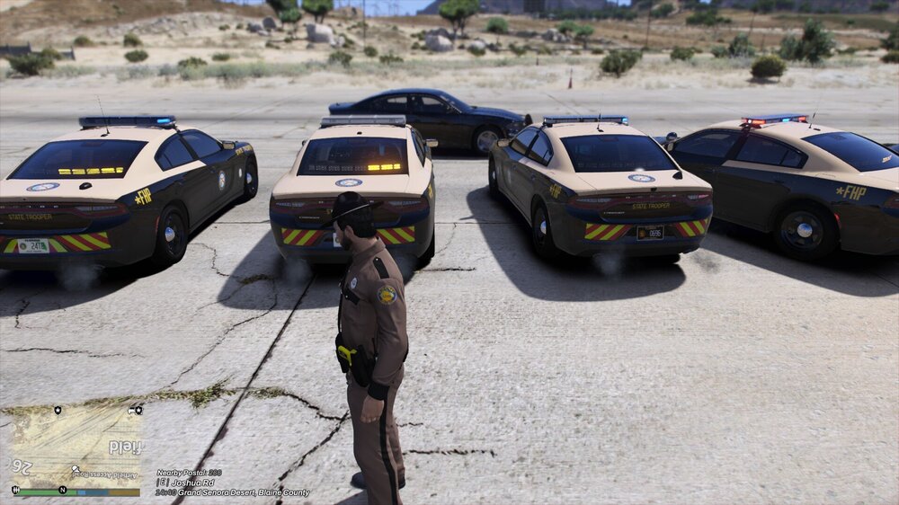 Could contain: outdoor, vehicle, land vehicle, wheel, tire, ground, transport, car, road, person, desert