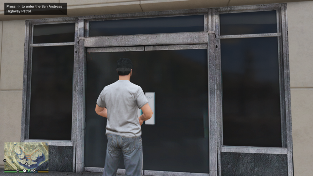 Could contain: clothing, building, person, man, door, outdoor, trousers, window, houseplant, flowerpot, standing, street