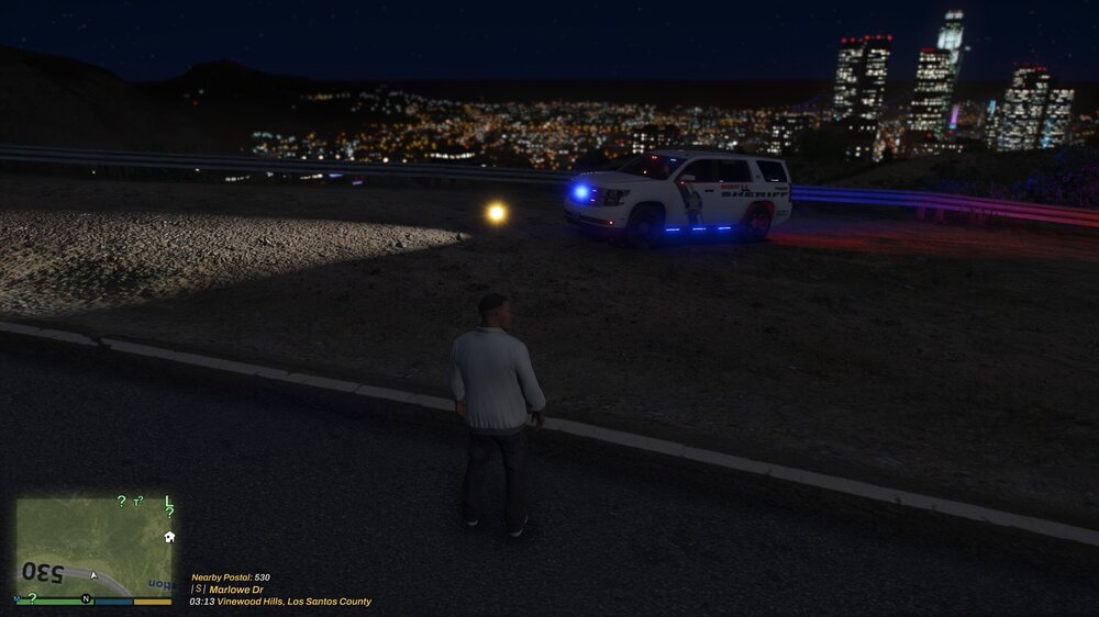 Could contain: outdoor, sky, screenshot, night, clothing, skyscraper, person, road, ground