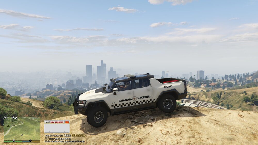 Could contain: vehicle, land vehicle, sky, transport, wheel, outdoor, tire, off-road vehicle, automotive tire, off-roading, military vehicle, jeep, mountain, ground, car