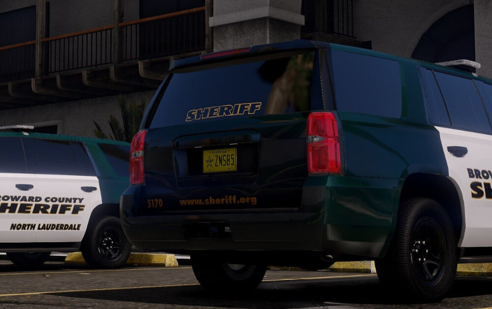 Could contain: text, vehicle, land vehicle, wheel, tire, outdoor, car, van, transport, vehicle registration plate, road, auto part, motor vehicle, automotive exterior, minivan, compact van, sport utility vehicle, mini mpv, mode of transport, automotive tail & brake light, street, police, parked