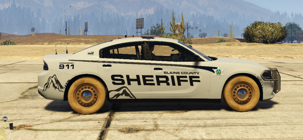 Could contain: vehicle, land vehicle, outdoor, transport, wheel, tire, motorsport, car, ground, mountain, racing