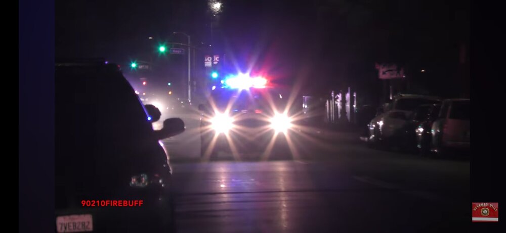 Could contain: vehicle, outdoor, lens flare, car, darkness, road, land vehicle, flare, light, street, night