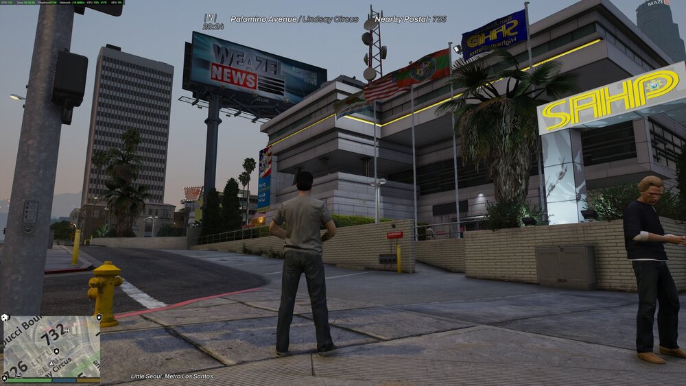 Could contain: outdoor, building, sky, clothing, billboard, tree, street, screenshot, text, person, city