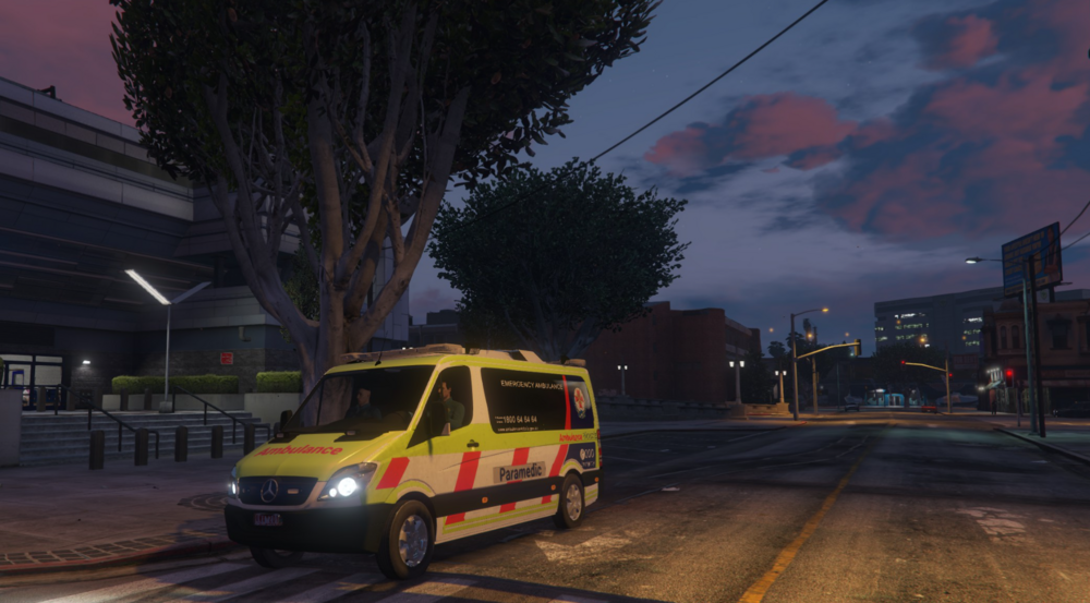 Could contain: vehicle, outdoor, land vehicle, transport, sky, road, van, wheel, ambulance, tree, mode of transport, car, street, ground, light