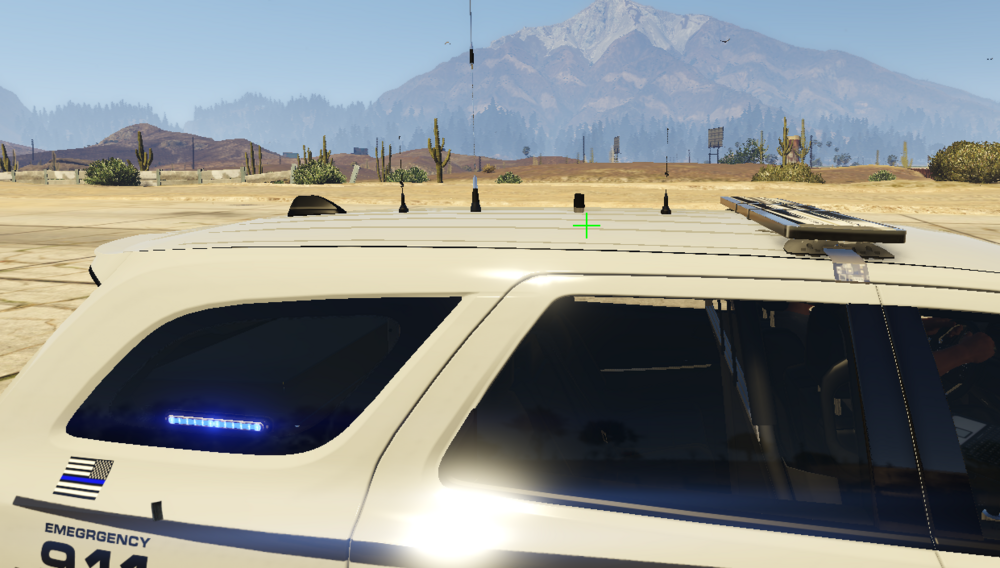 Could contain: outdoor, land vehicle, sky, mountain, automotive carrying rack, automotive luggage rack, roof rack, automotive exterior, wheel, transport, sport utility vehicle, van, desert, parked, vehicle, car