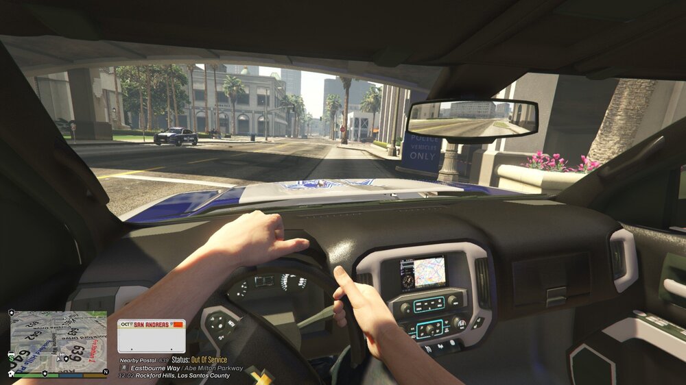 Could contain: vehicle, text, car, land vehicle, transport, mirror, windshield, center console, steering wheel, vehicle audio, person, control panel, indoor, cockpit
