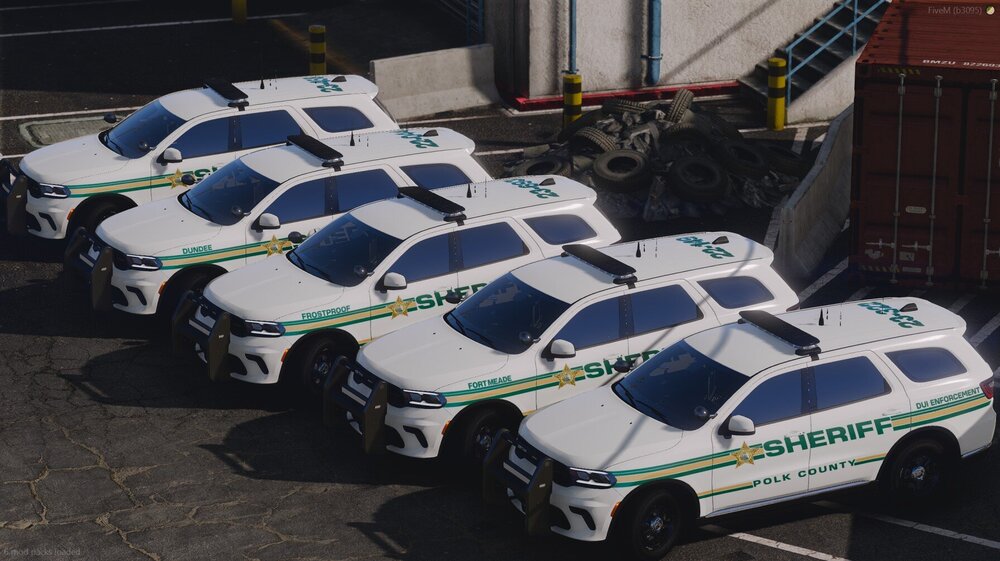 Could contain: vehicle, land vehicle, wheel, outdoor, car, police, transport, road, street, parked, ground