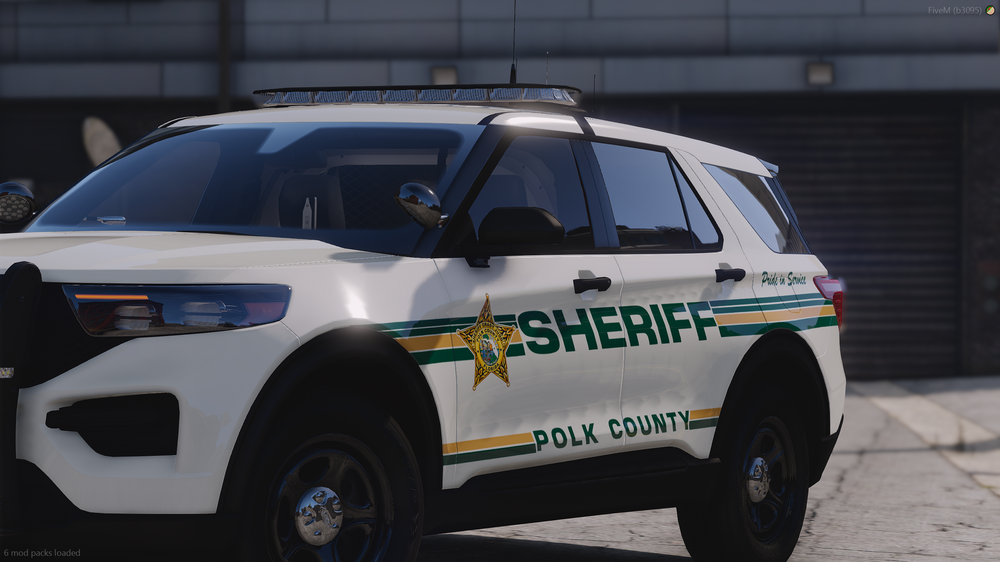 Could contain: vehicle, land vehicle, wheel, tire, text, car, transport, outdoor, auto part, sport utility vehicle, bumper, ford, automotive tire, automotive exterior, fender, motor vehicle, compact sport utility vehicle, mitsubishi, roof rack, crossover suv, street, rally, police