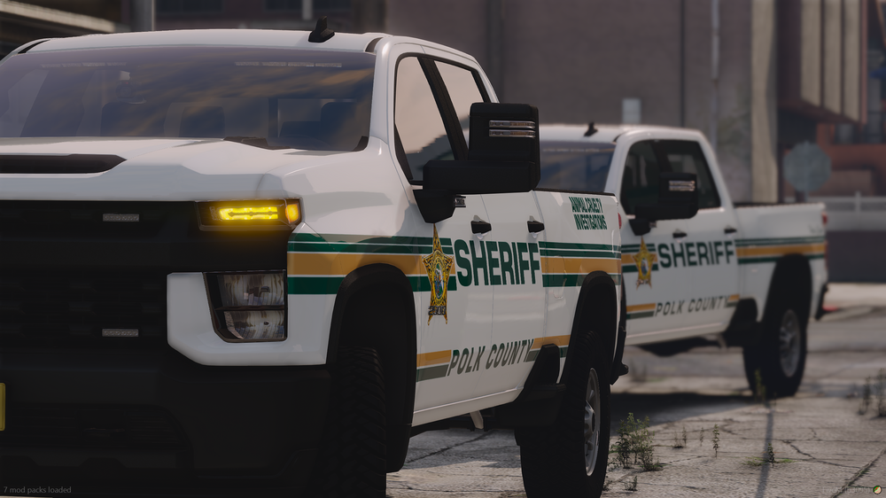 Could contain: outdoor, tire, land vehicle, wheel, text, auto part, car, automotive exterior, ground, building, road, bumper, motor vehicle, transport, parked, truck, street, vehicle