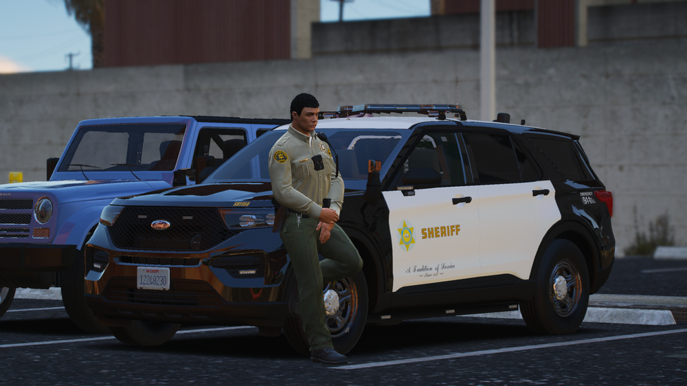 Could contain: vehicle, land vehicle, wheel, tire, outdoor, police, car, sport utility vehicle, transport, bumper, roof rack, auto part, automotive luggage rack, road, compact sport utility vehicle, motor vehicle, automotive carrying rack, person, automotive exterior, fender, ford, crossover suv, law enforcement, automotive tire, street