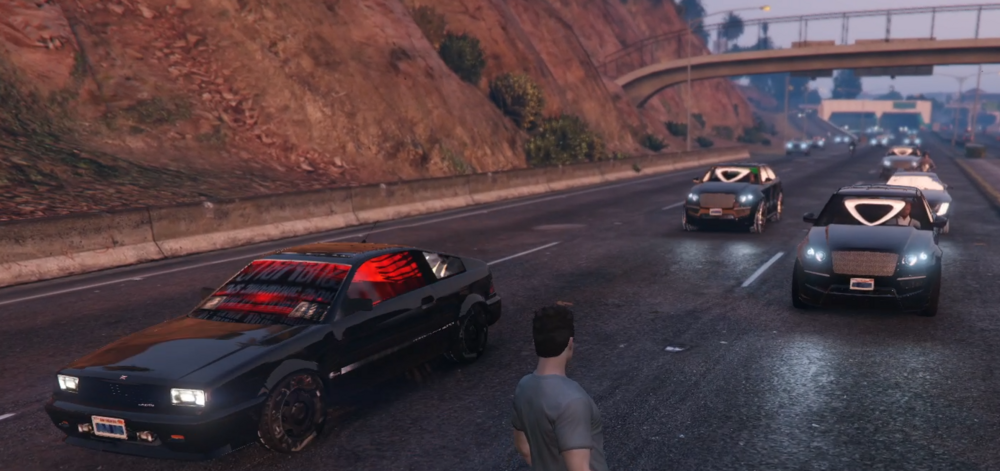 Could contain: vehicle, land vehicle, wheel, road, outdoor, car, tire, automotive design, luxury vehicle, sports car, auto part, performance car, ground, person, mountain, street