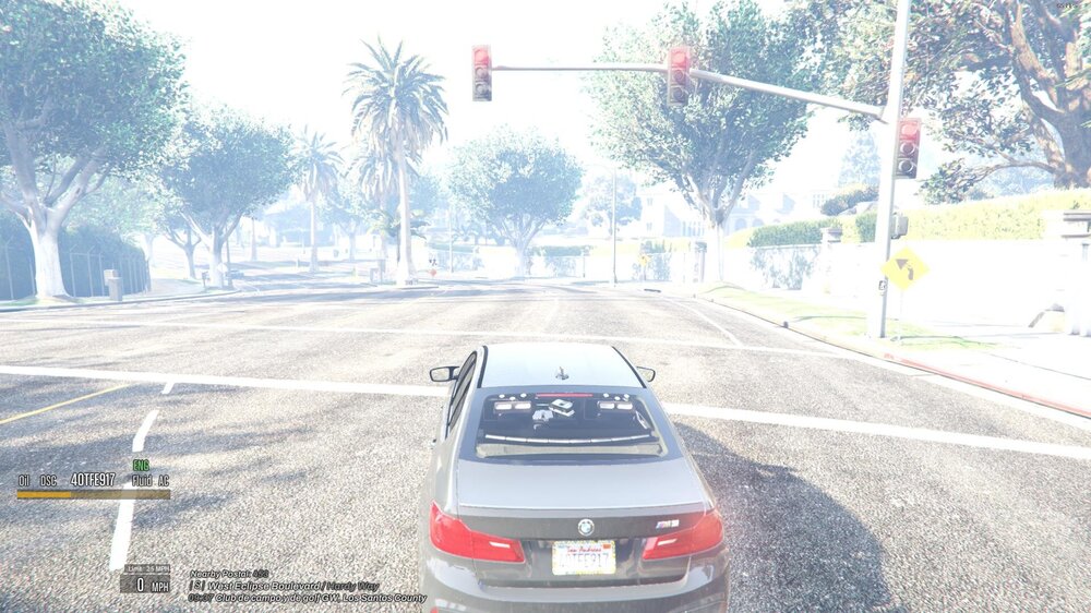 Could contain: outdoor, vehicle, land vehicle, text, tree, sky, wheel, vehicle registration plate, road, automotive tail & brake light, tire, street, auto part, traffic, ground, way, light, car