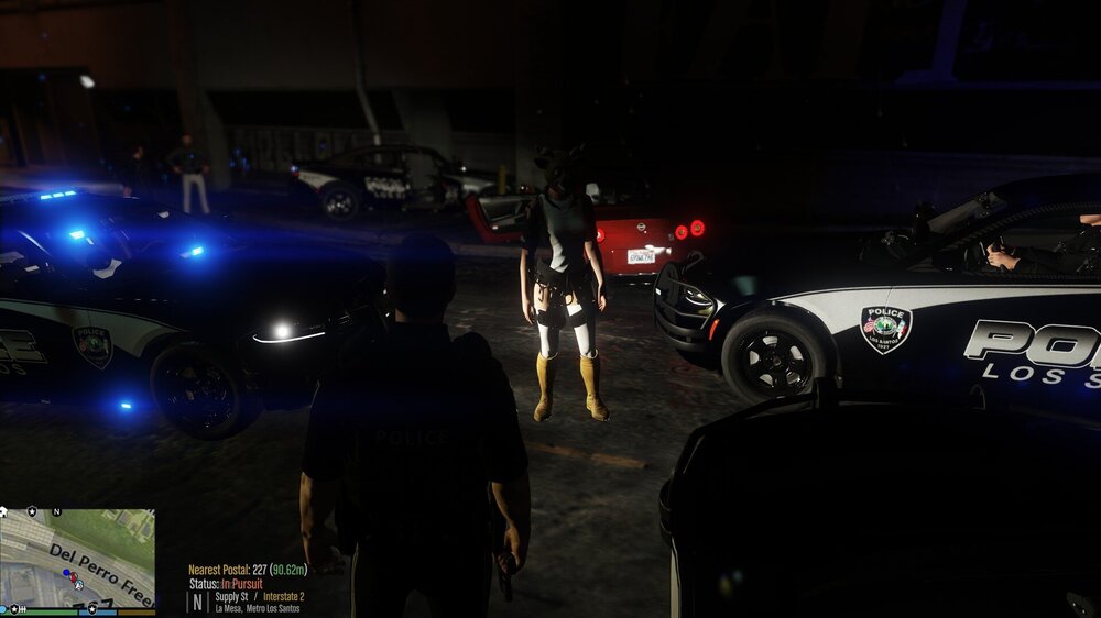 Could contain: vehicle, land vehicle, wheel, text, tire, automotive design, auto part, automotive lighting, car, automotive exterior, person, police, parked, light