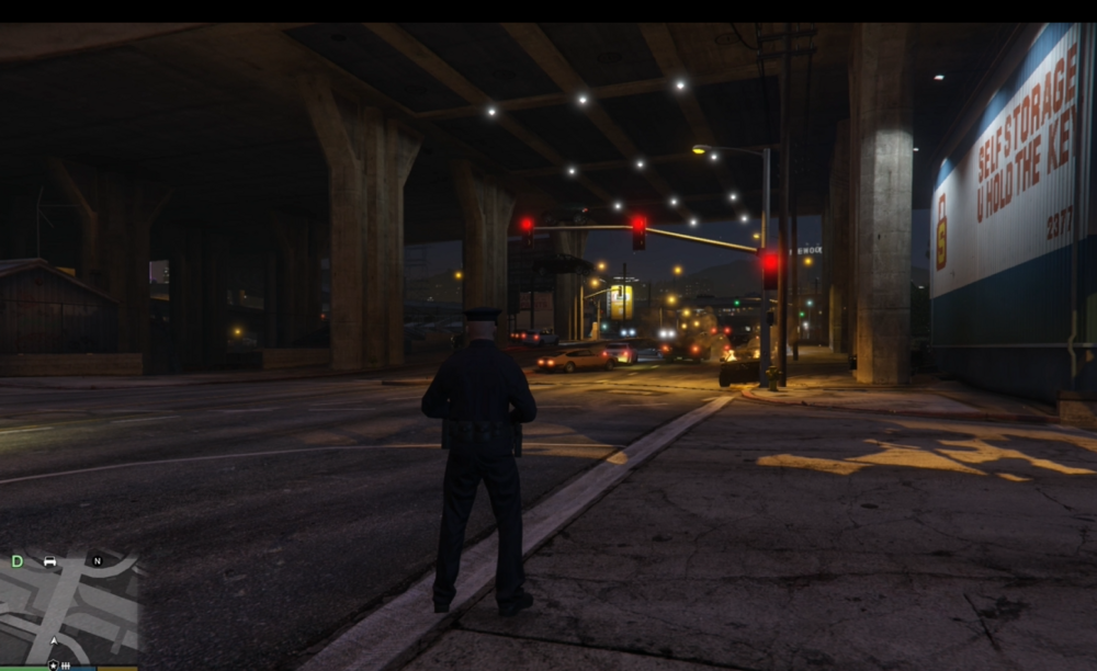 Could contain: screenshot, outdoor, pc game, road, firefighter, street, light, person, ground, night