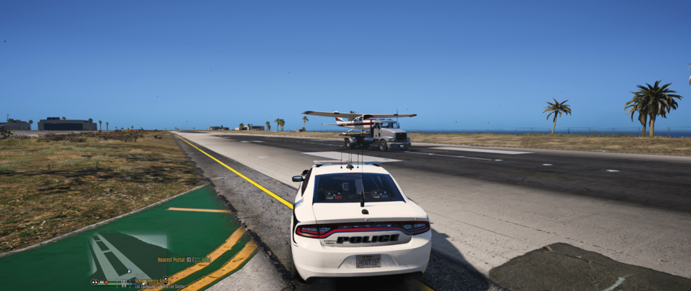 Could contain: outdoor, vehicle, sky, land vehicle, road, wheel, text, car, vehicle registration plate, tire, asphalt, tarmac, freeway, motor vehicle, lane, road surface, ground, grass, street, highway, driving