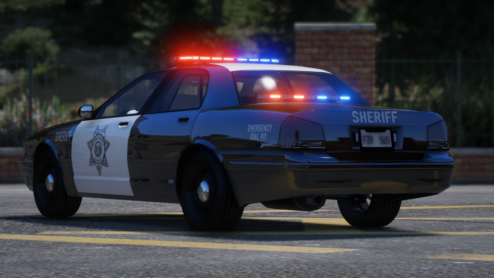 Could contain: vehicle, land vehicle, outdoor, wheel, transport, car, road, law enforcement, police car, tire, full-size car, ford crown victoria police interceptor, auto part, text, automotive exterior, automotive light bulb, ford, emergency service, police, street, driving