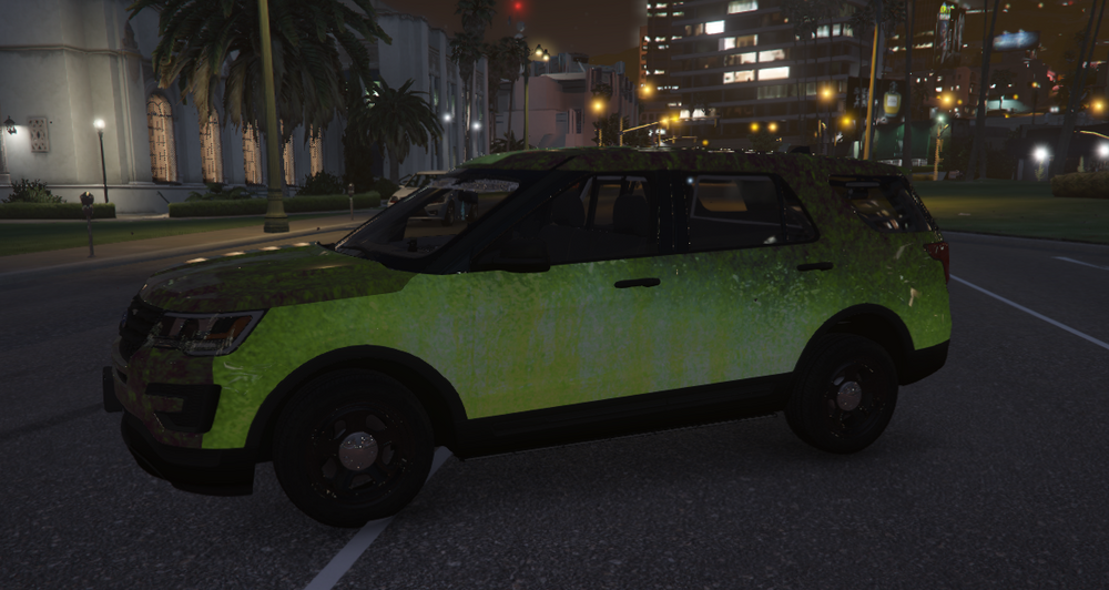 Could contain: vehicle, land vehicle, wheel, transport, outdoor, tire, road, building, green, street, car, light, night, parked