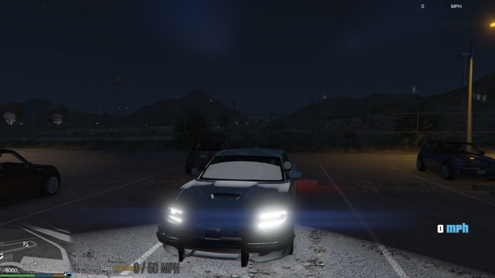 Could contain: vehicle, land vehicle, sky, wheel, outdoor, screenshot, car, night, light, ground