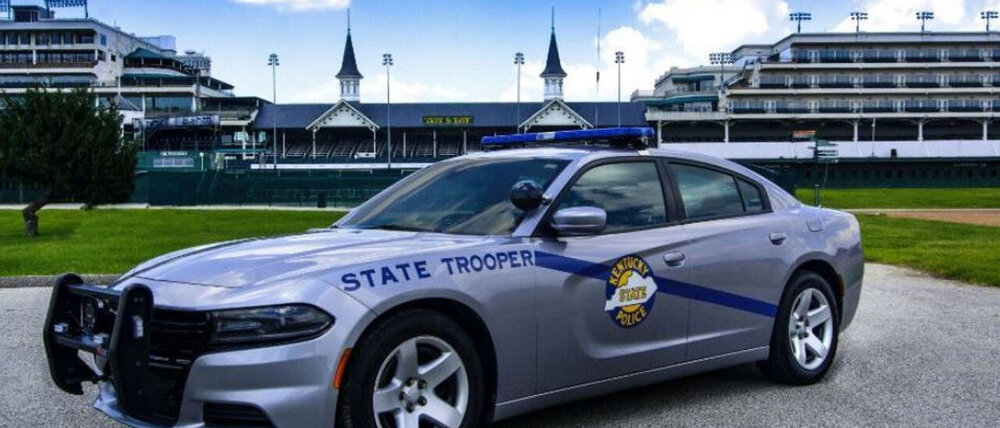 Could contain: vehicle, land vehicle, wheel, transport, car, outdoor, tire, mid-size car, full-size car, alloy wheel, sports sedan, subaru, bumper, sedan, police, automotive design, police car, rim, parked