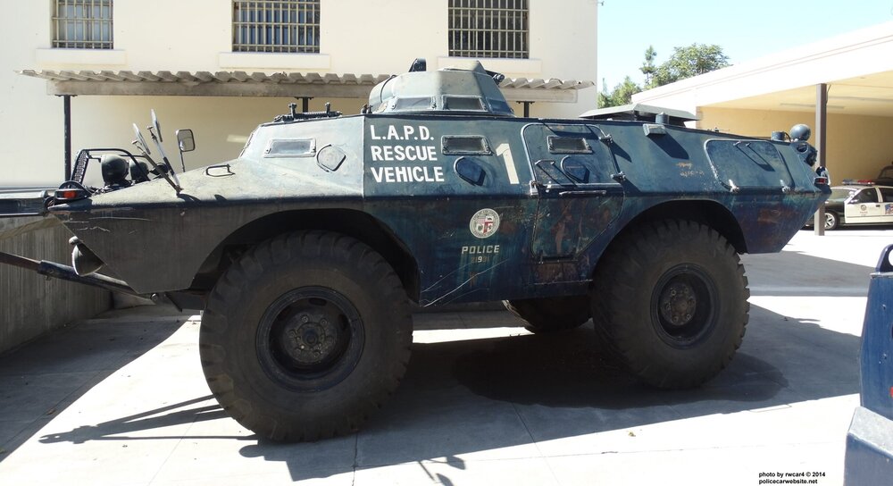 Could contain: transport, vehicle, wheel, military vehicle, land vehicle, tire, outdoor, combat vehicle, armored car, auto part, humvee, automotive tire, military, parked