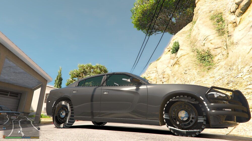 Could contain: wheel, outdoor, tire, land vehicle, vehicle, transport, automotive design, luxury vehicle, auto part, car, ground, personal luxury car, alloy wheel, rim, sports car, parked