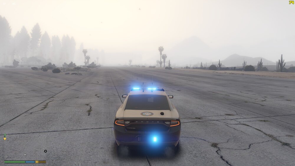 Could contain: vehicle, land vehicle, outdoor, sky, wheel, fog, ground, tire, transport, road, car