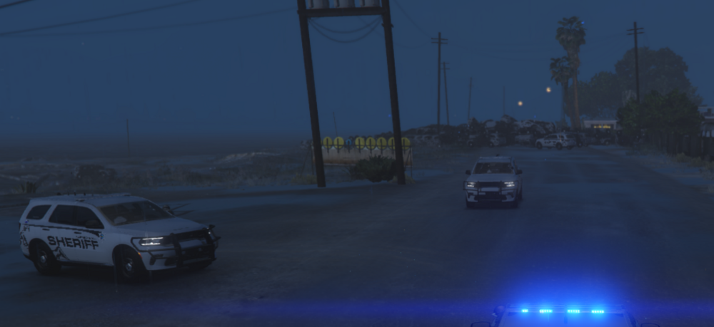 Could contain: vehicle, land vehicle, sky, outdoor, wheel, road, car, transport, tire, fog, street, light, night