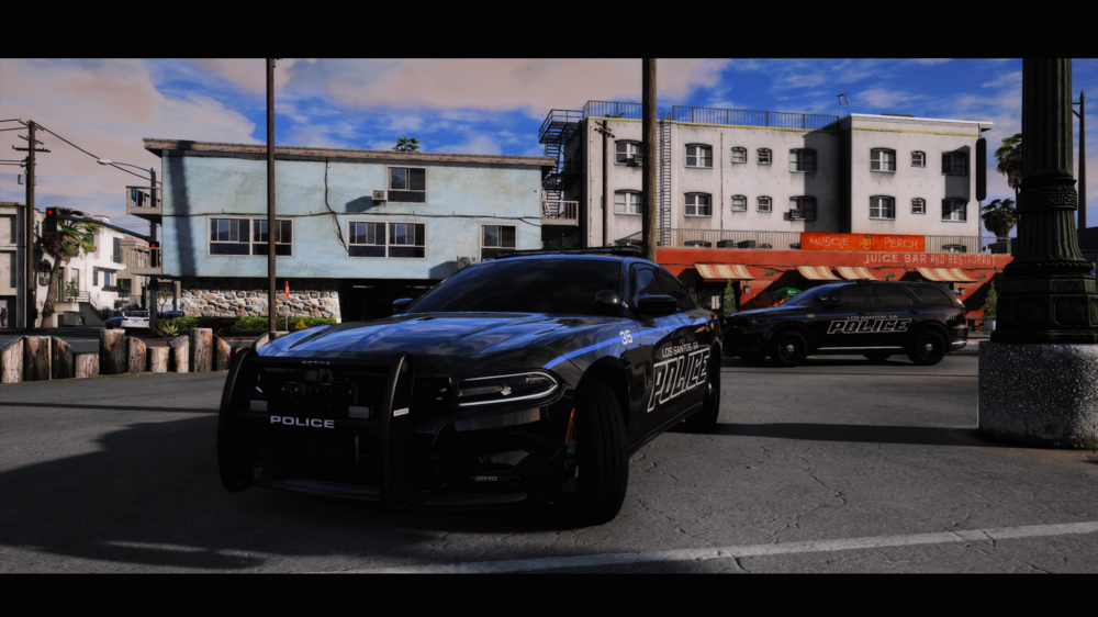 Could contain: vehicle, land vehicle, car, sky, outdoor, luxury vehicle, wheel, automotive design, tire, building, personal luxury car, bumper, sports sedan, chevrolet camaro, road, ground, street