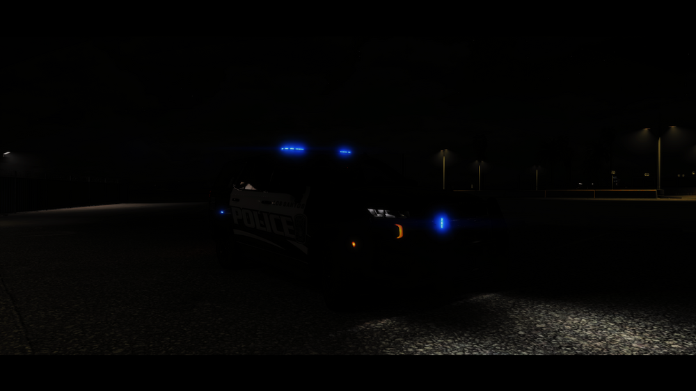 Could contain: vehicle, land vehicle, outdoor, road, darkness, night, car, light, dark, street