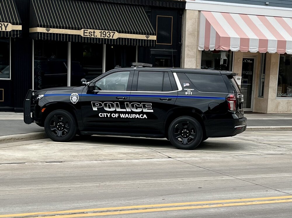 Could contain: vehicle, land vehicle, wheel, text, tire, outdoor, transport, auto part, sport utility vehicle, building, automotive exterior, car, motor vehicle, bumper, compact sport utility vehicle, law enforcement, road, fender, police car, automotive tire, vehicle registration plate, police, street, parked