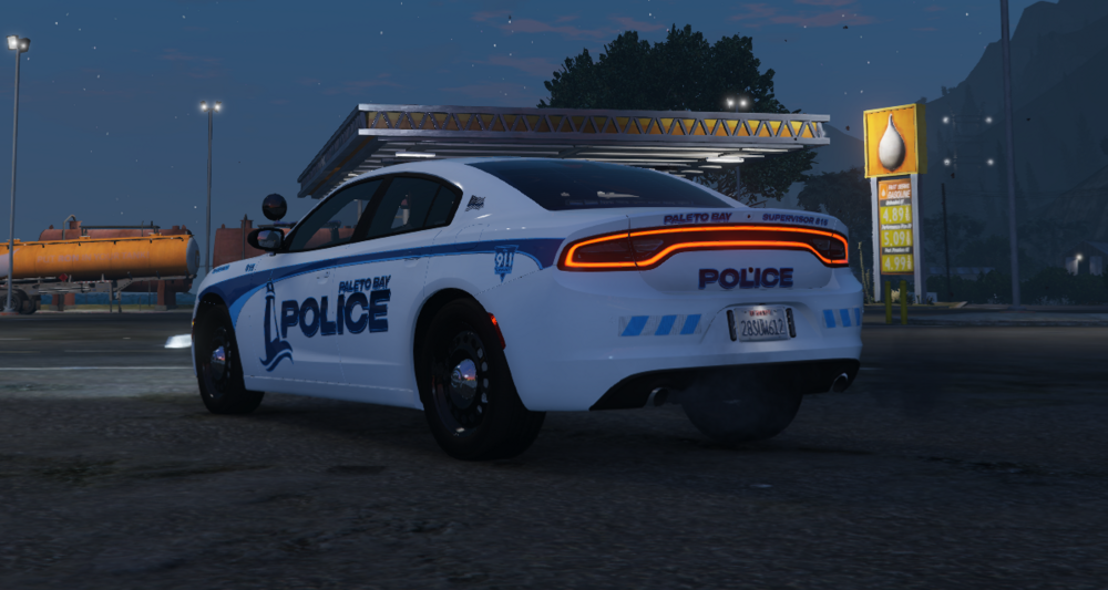 Could contain: vehicle, land vehicle, wheel, outdoor, transport, sky, text, road, tire, police car, auto part, car, mode of transport, ford, automotive exterior, street, police, blue, van