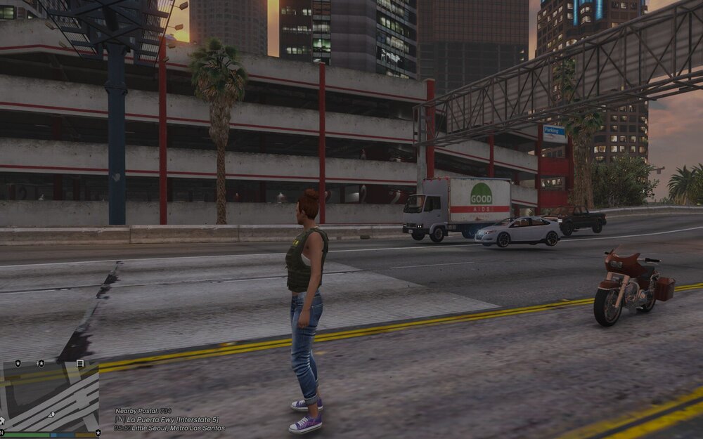 Could contain: outdoor, road, building, wheel, land vehicle, vehicle, skyscraper, street, city, downtown