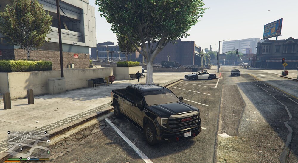 Could contain: outdoor, vehicle, land vehicle, sky, ground, wheel, building, tree, car, road, truck, street, city, track