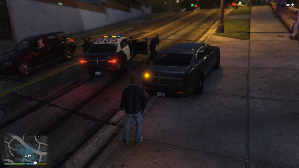 Could contain: vehicle, land vehicle, wheel, outdoor, road, car, tire, way, street, traffic, ground, sidewalk, night, light, city