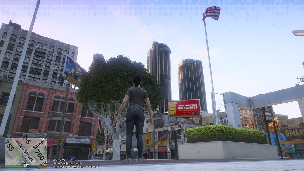 Could contain: outdoor, sky, building, billboard, tree, downtown, mixed-use, skyscraper, metropolitan area, urban area, town, street, city, sign, flag